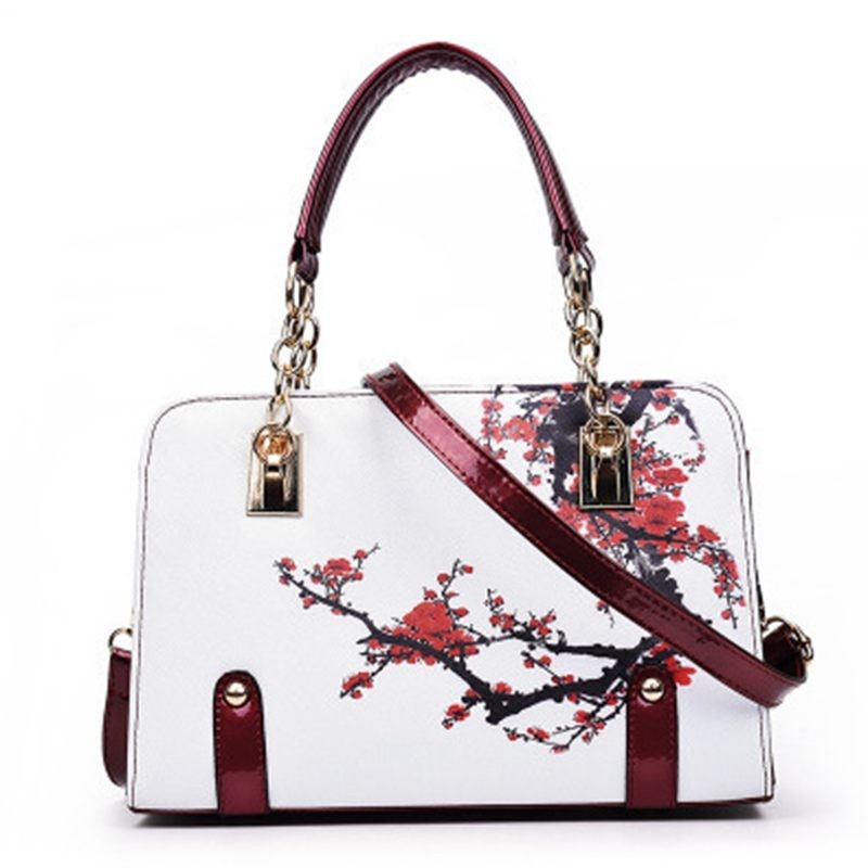 Leather bag with floral printHandbags